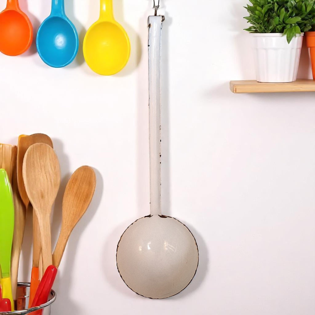 Vintage white enameled ladle
