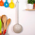 Vintage white enameled ladle