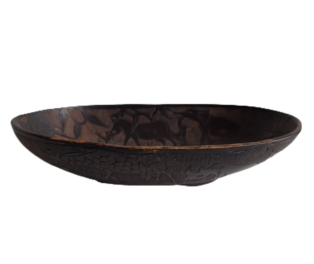 Hand-carved wooden bowl with animal motifs – African craftsmanship