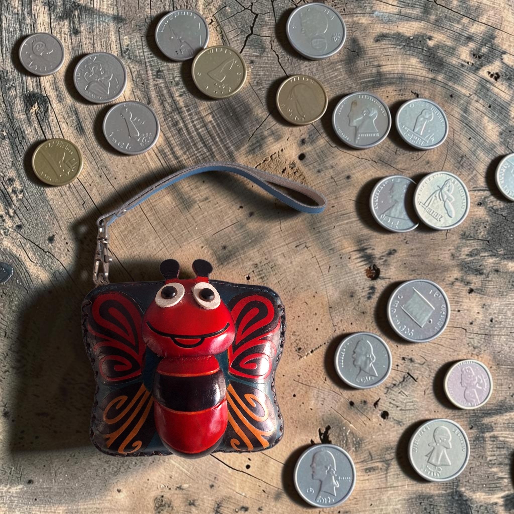Leren vlinder muntportemonnee uit India - rood insectenmotief