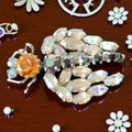 Insektenbrosche mit Strass – Funkelnder Modeschmuck aus den 80ern