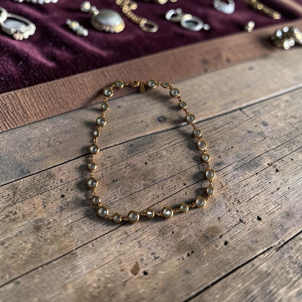 Ciro vintage gouden schakelketting met ronde kristallen in bezel, totale lengte 44cm
