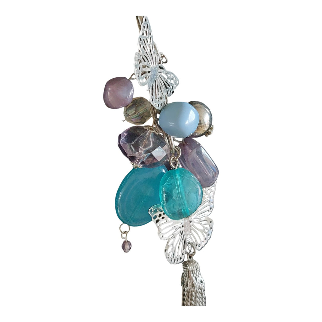 silver-colored necklace beads and butterflies