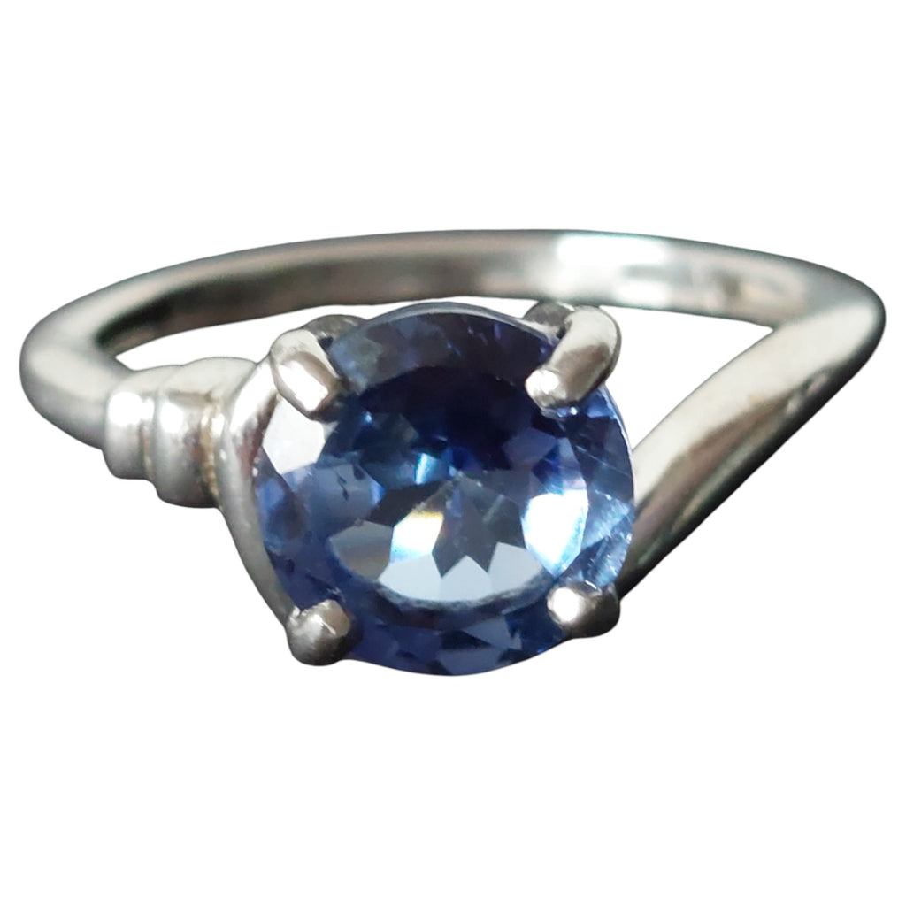 Vintage damesring - verzilverd solitaire met lichtblauwe steen