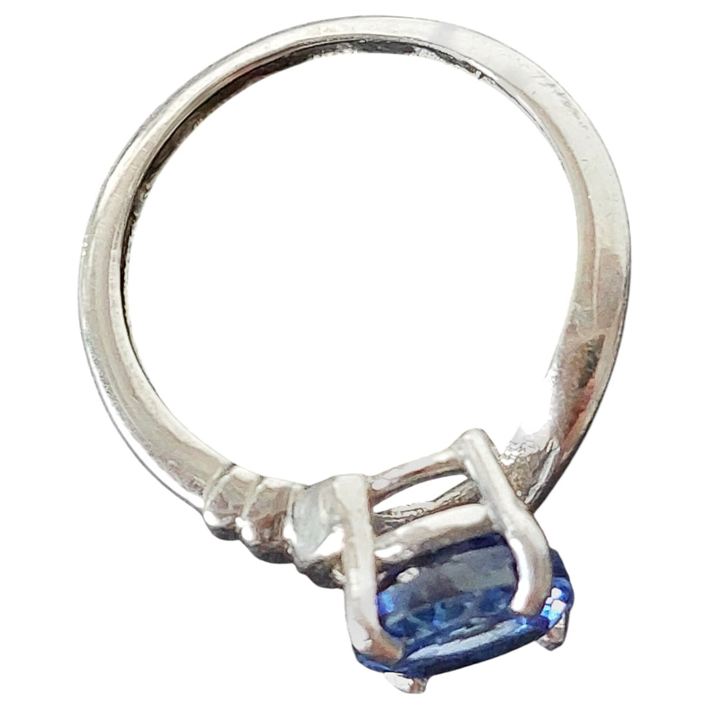 Vintage damesring - verzilverd solitaire met lichtblauwe steen
