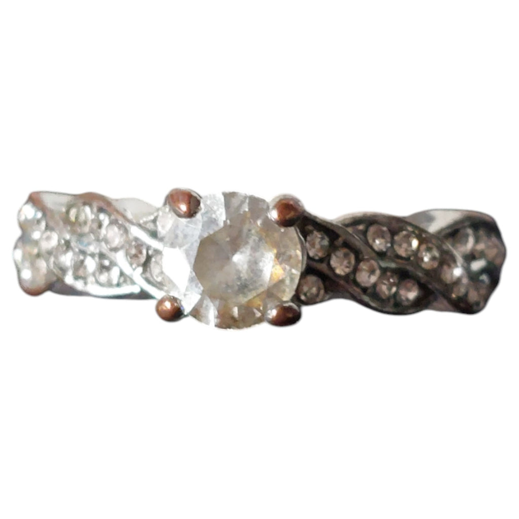 Vintage damesring - verzilverd gedraaide band met strass solitaire