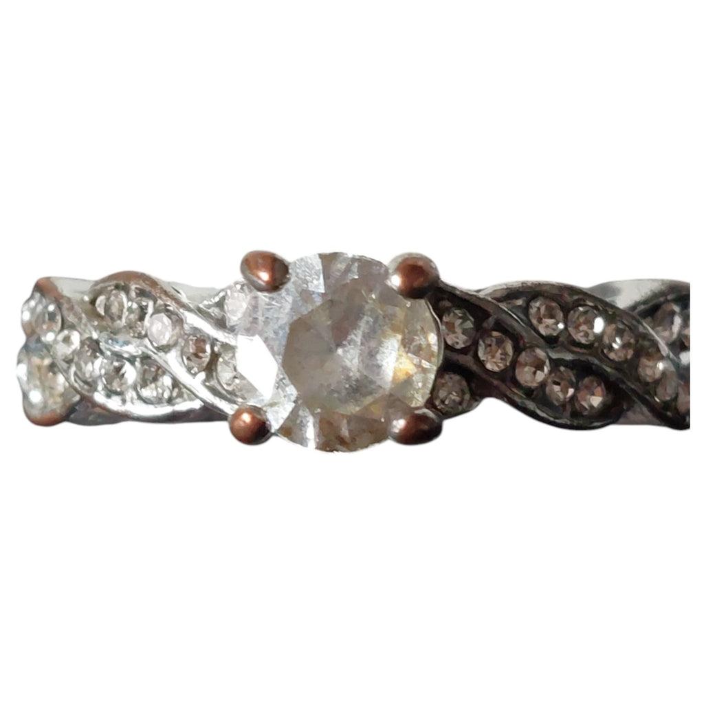Vintage damesring - verzilverd gedraaide band met strass solitaire