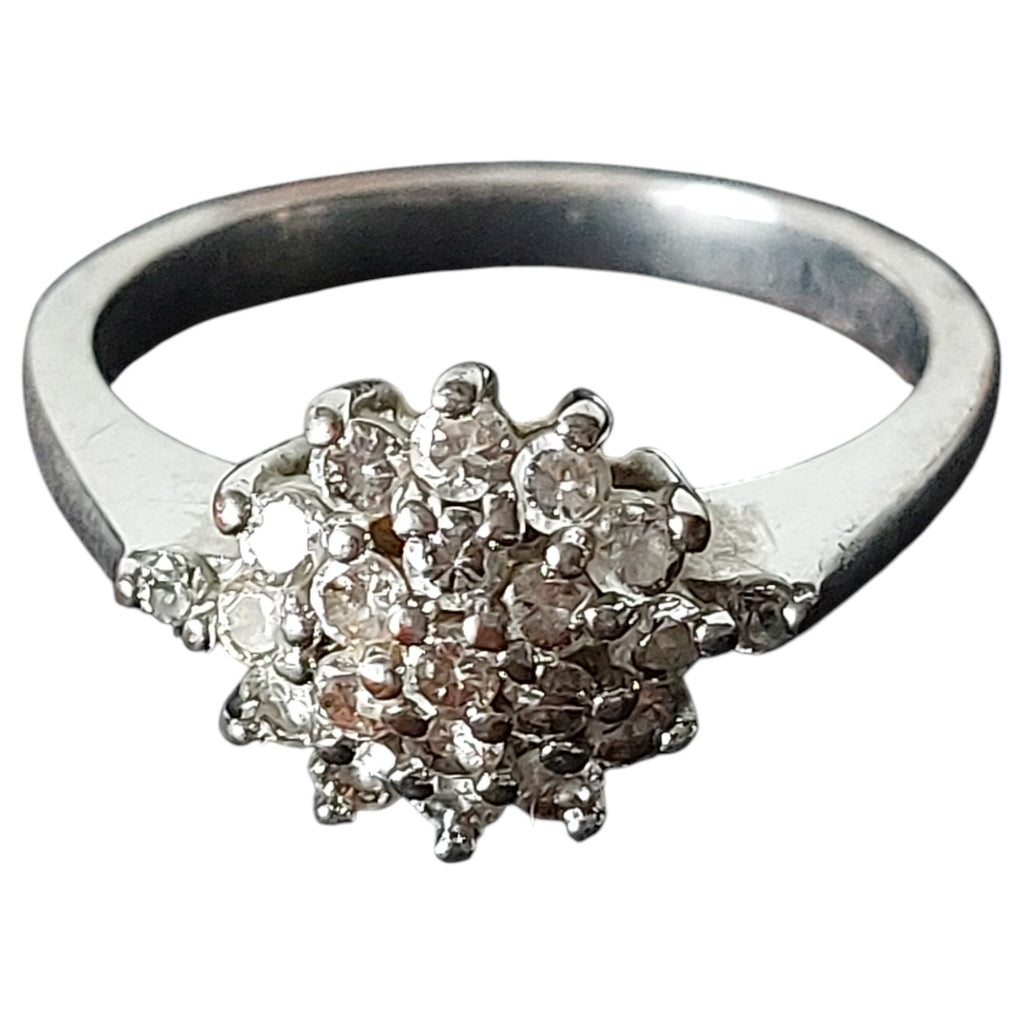 Vintage damesring - zilverkleurig rozet met strass in bloemmotief