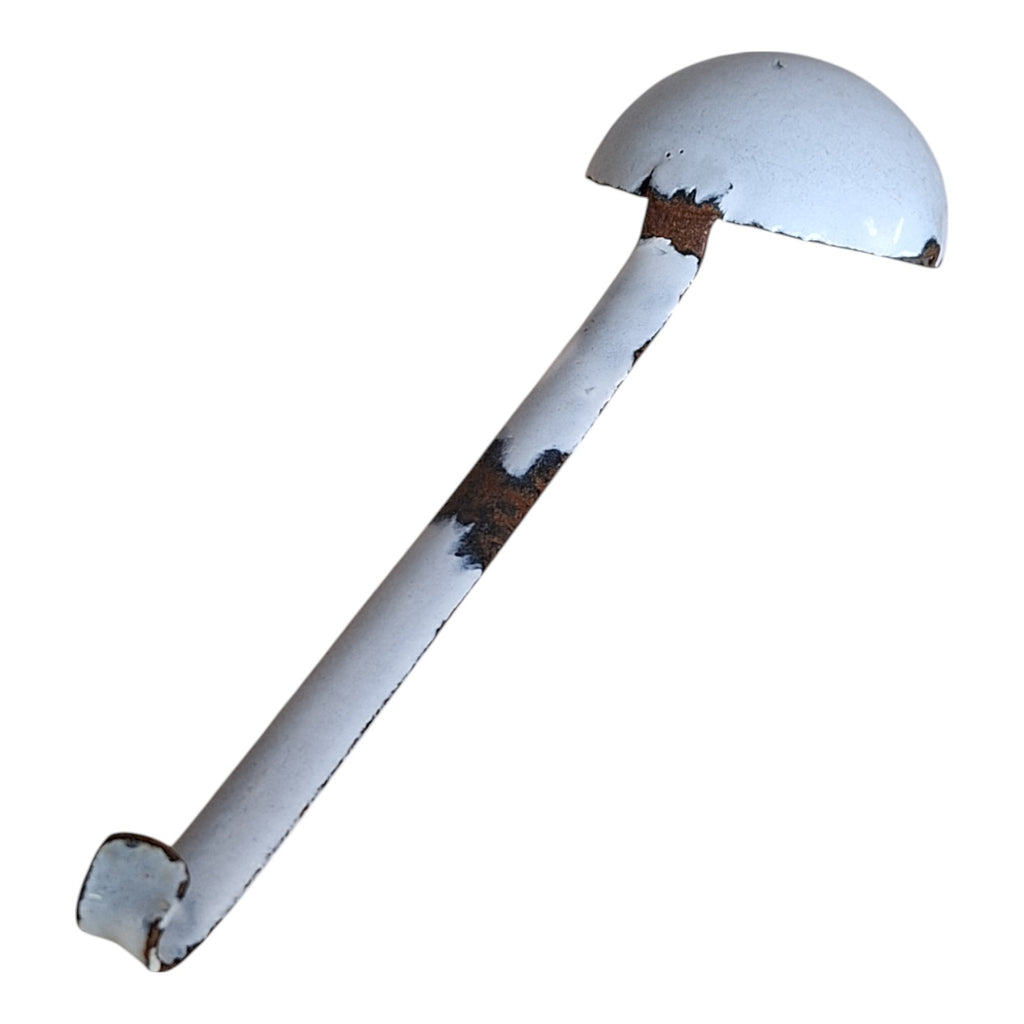 Vintage white with a bluish sheen enameled gravy spoon