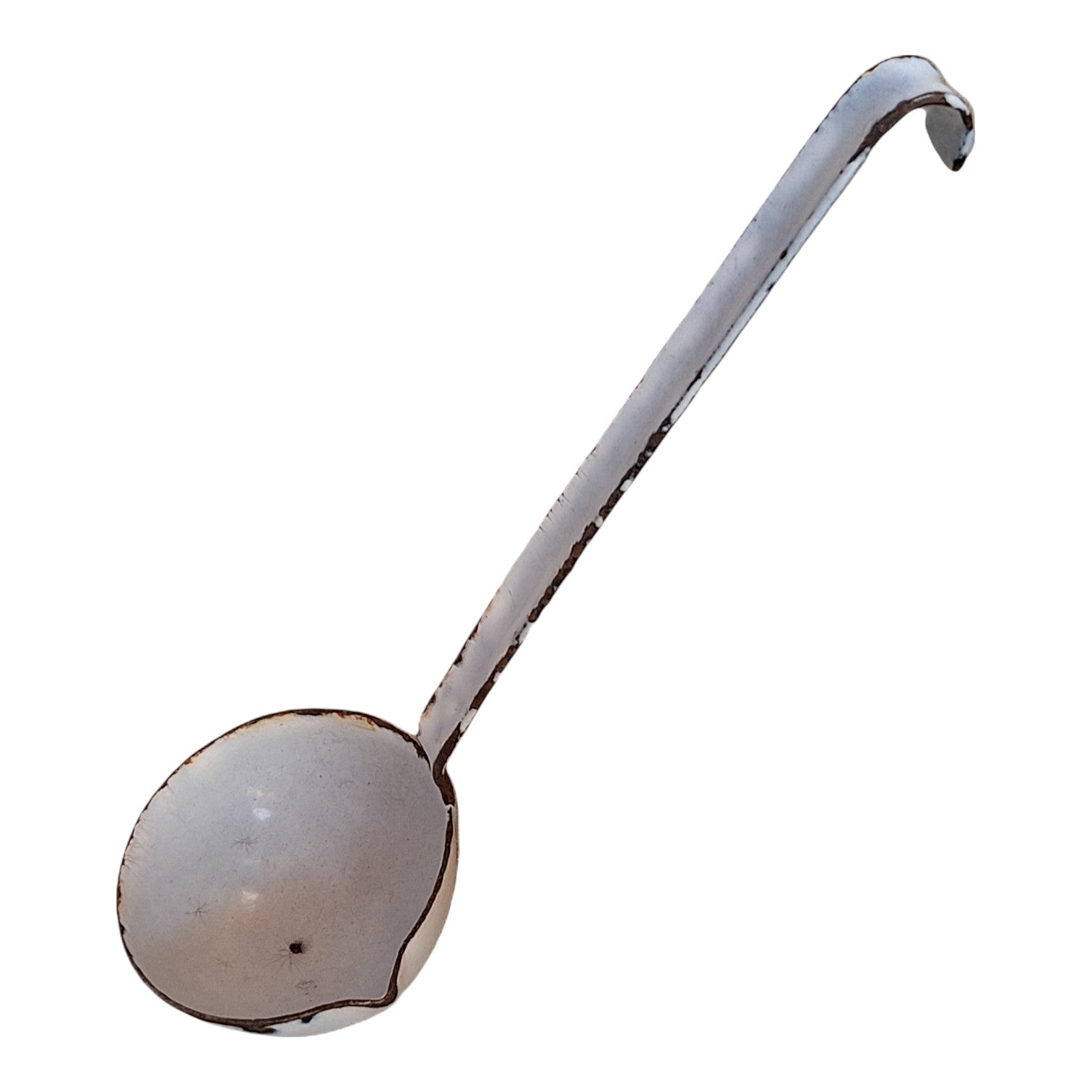 Vintage white with a bluish sheen enameled gravy spoon