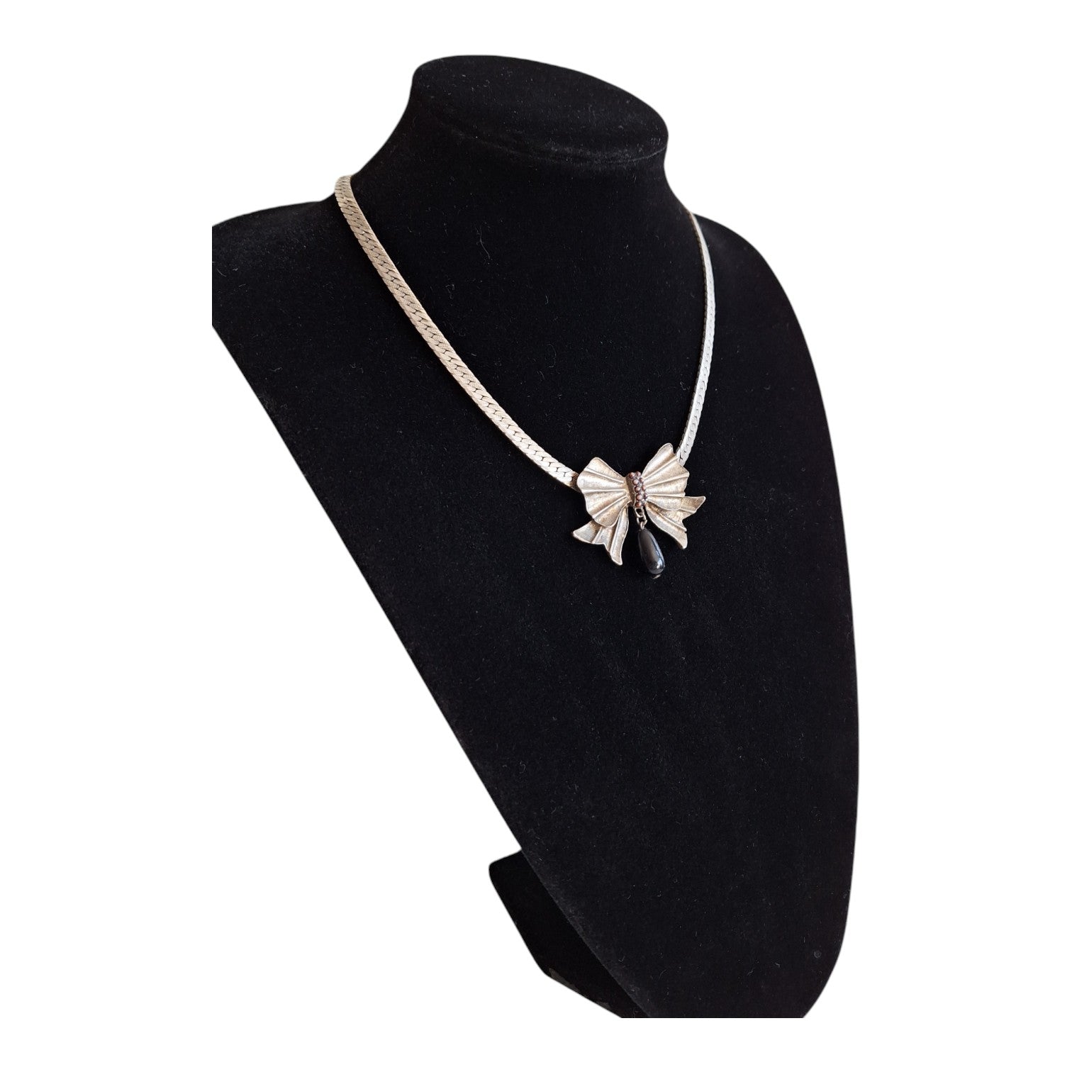 Silver-coloured necklace with pendant