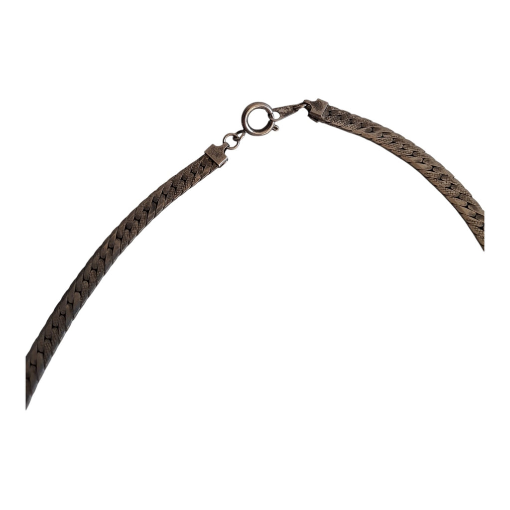 Silver-coloured necklace with pendant