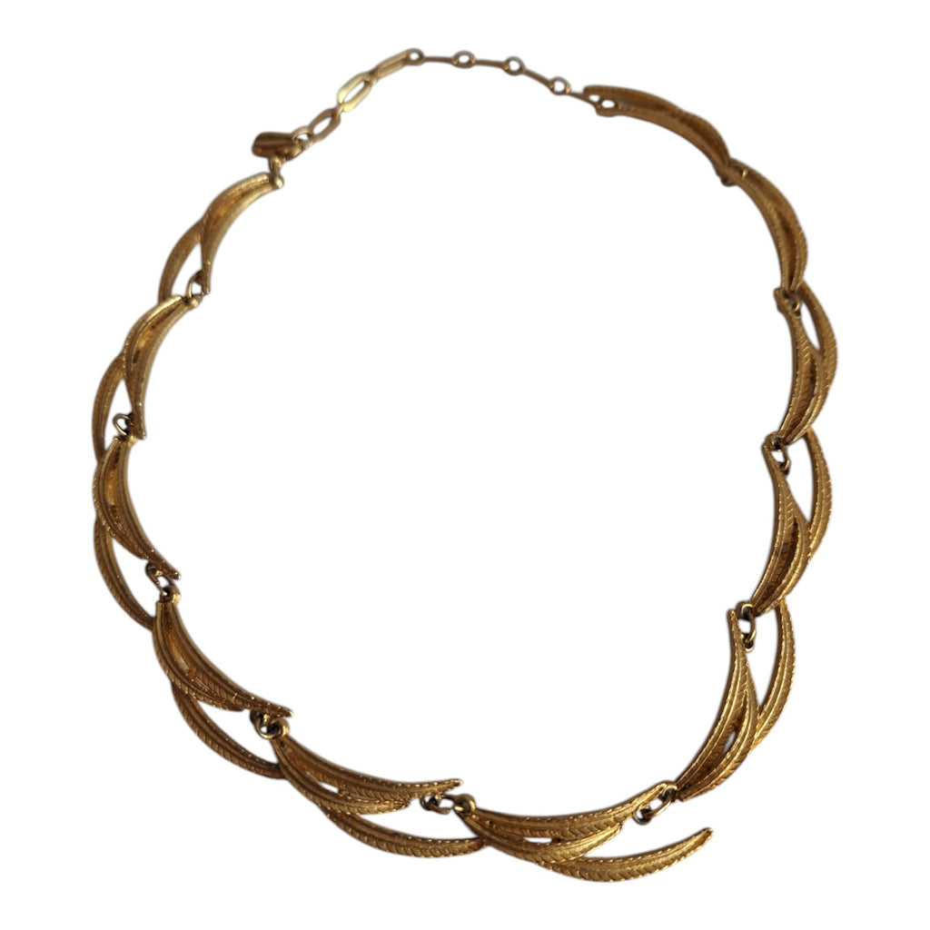 Gold-tone necklace, three leaves per link