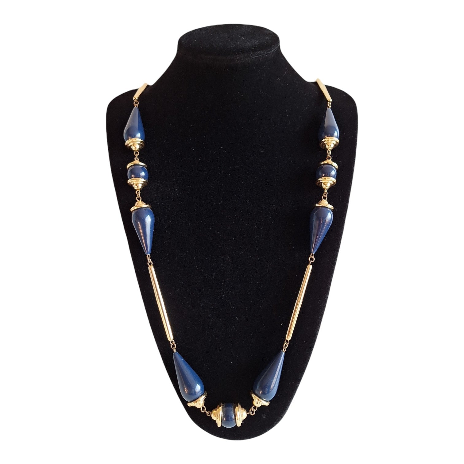 Gold-colored necklace with various blue wooden beads