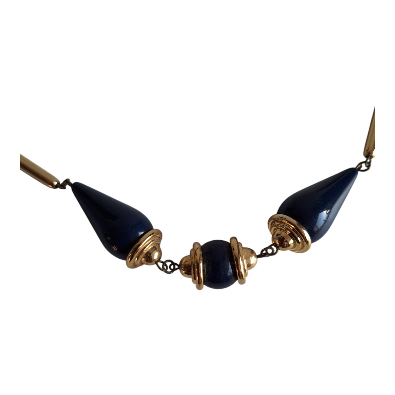 Gold-colored necklace with various blue wooden beads