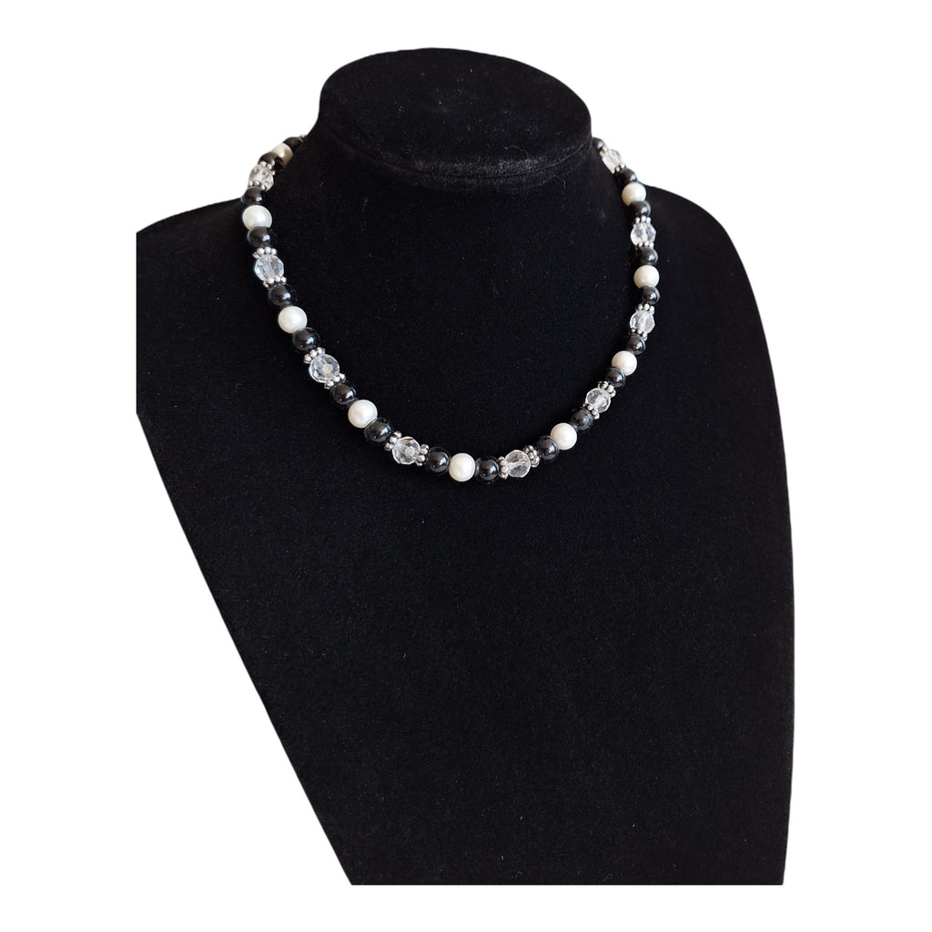Necklace with black, white, and transparent beads