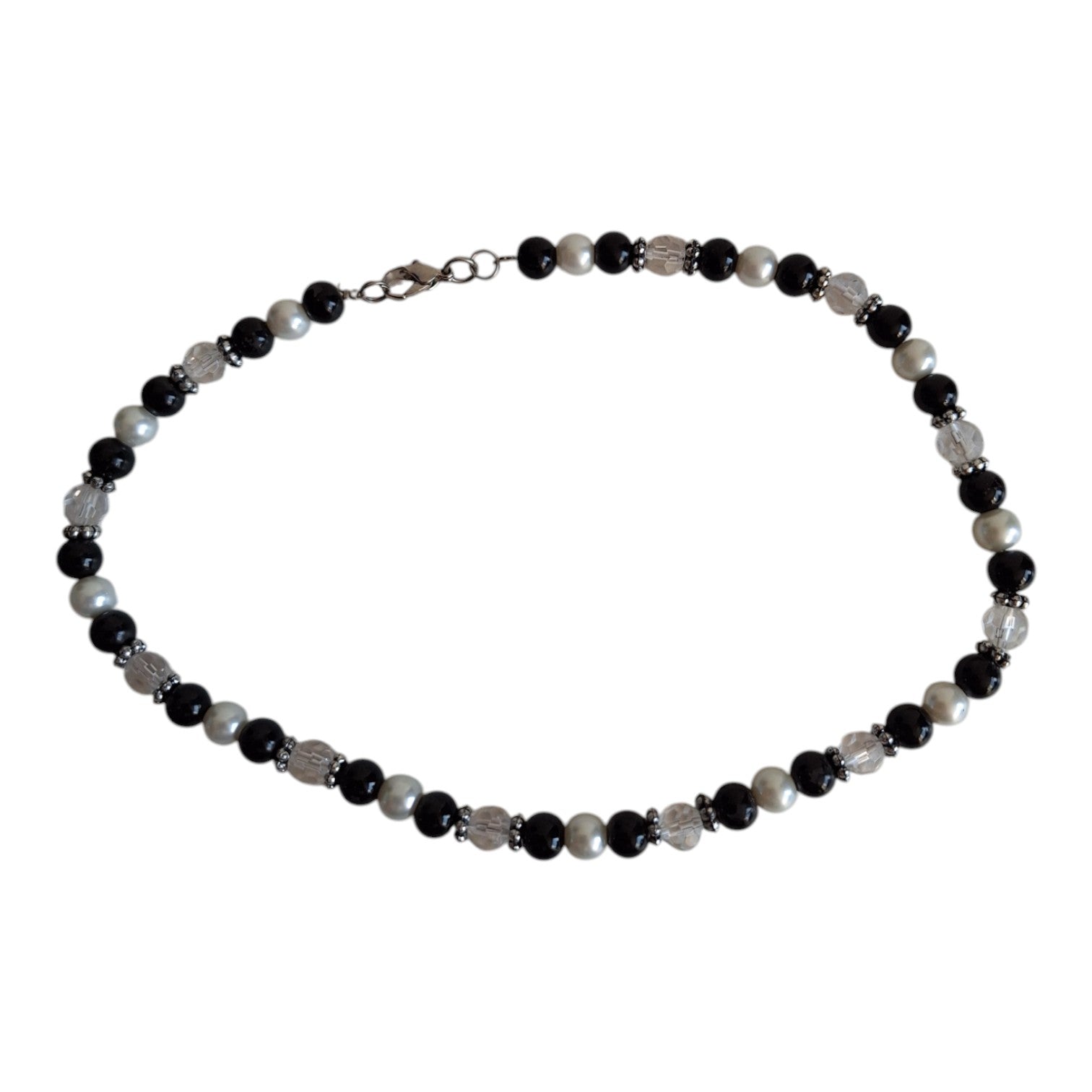 Necklace with black, white, and transparent beads
