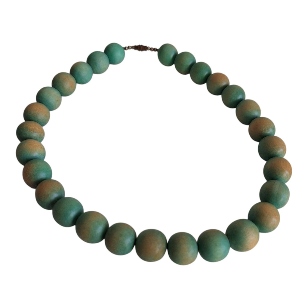 Wooden bead necklace with green tint