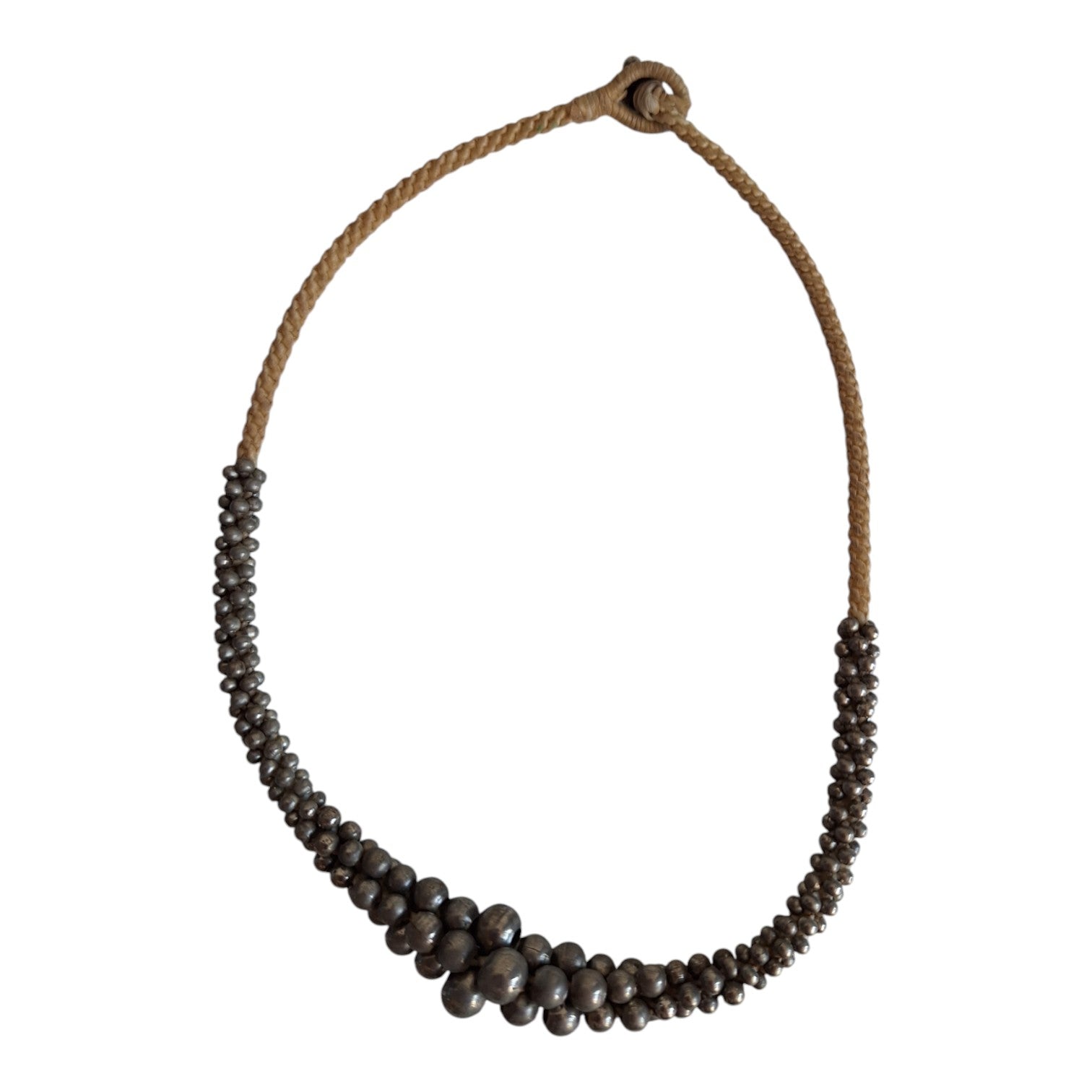 Silver-colored beads strung on a cord
