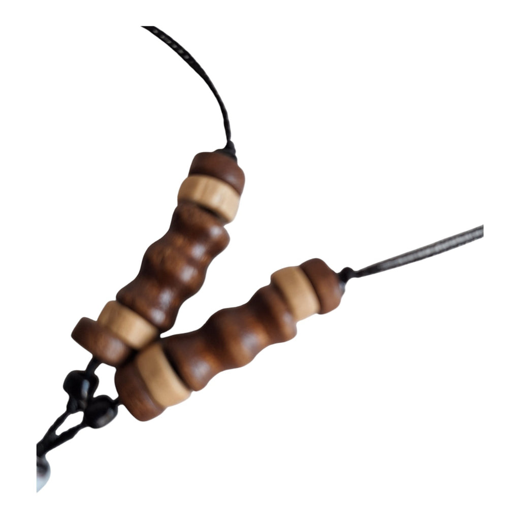 Necklace with wooden pendant and beads