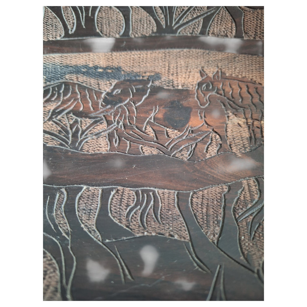 Hand-carved wooden bowl with animal motifs – African craftsmanship