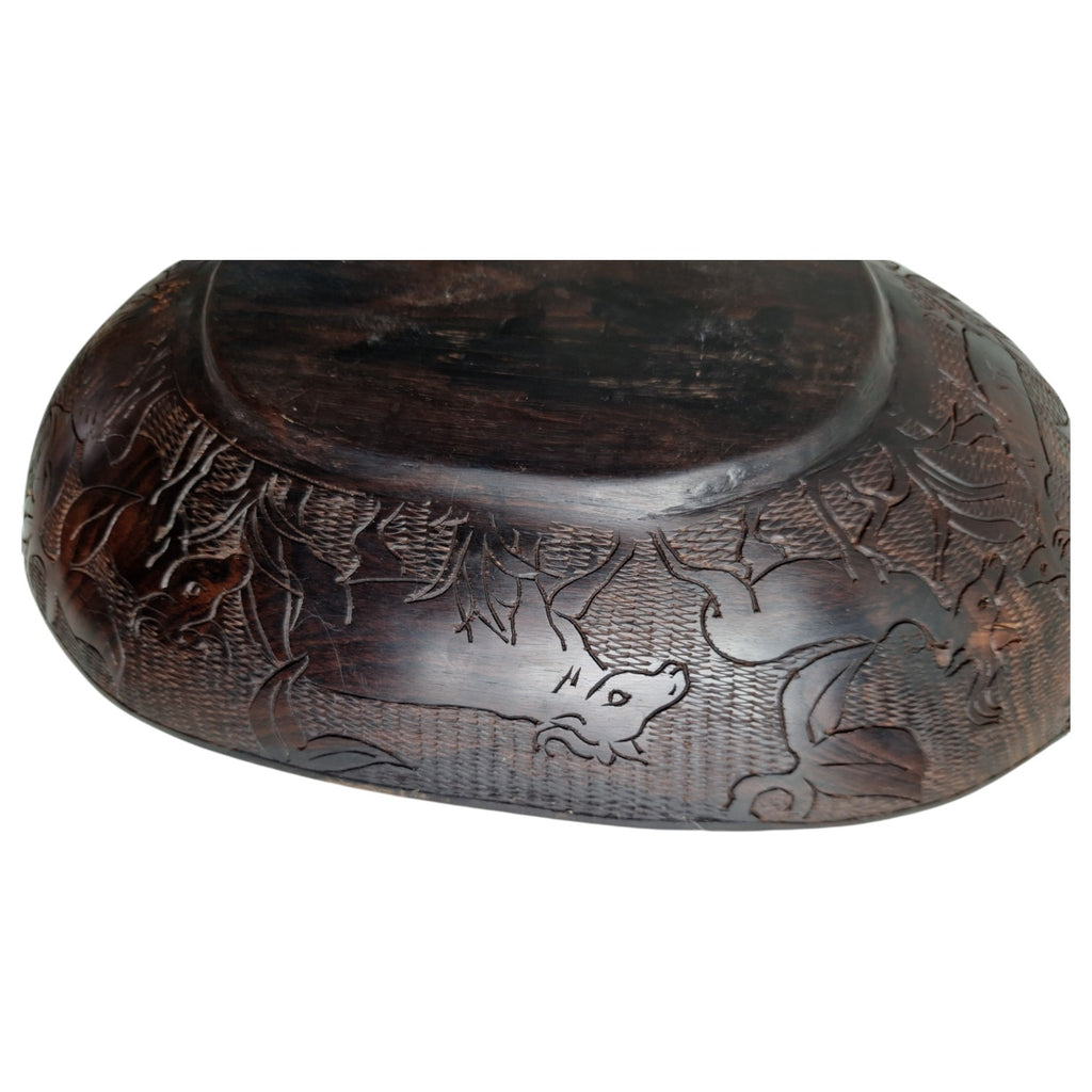 Hand-carved wooden bowl with animal motifs – African craftsmanship