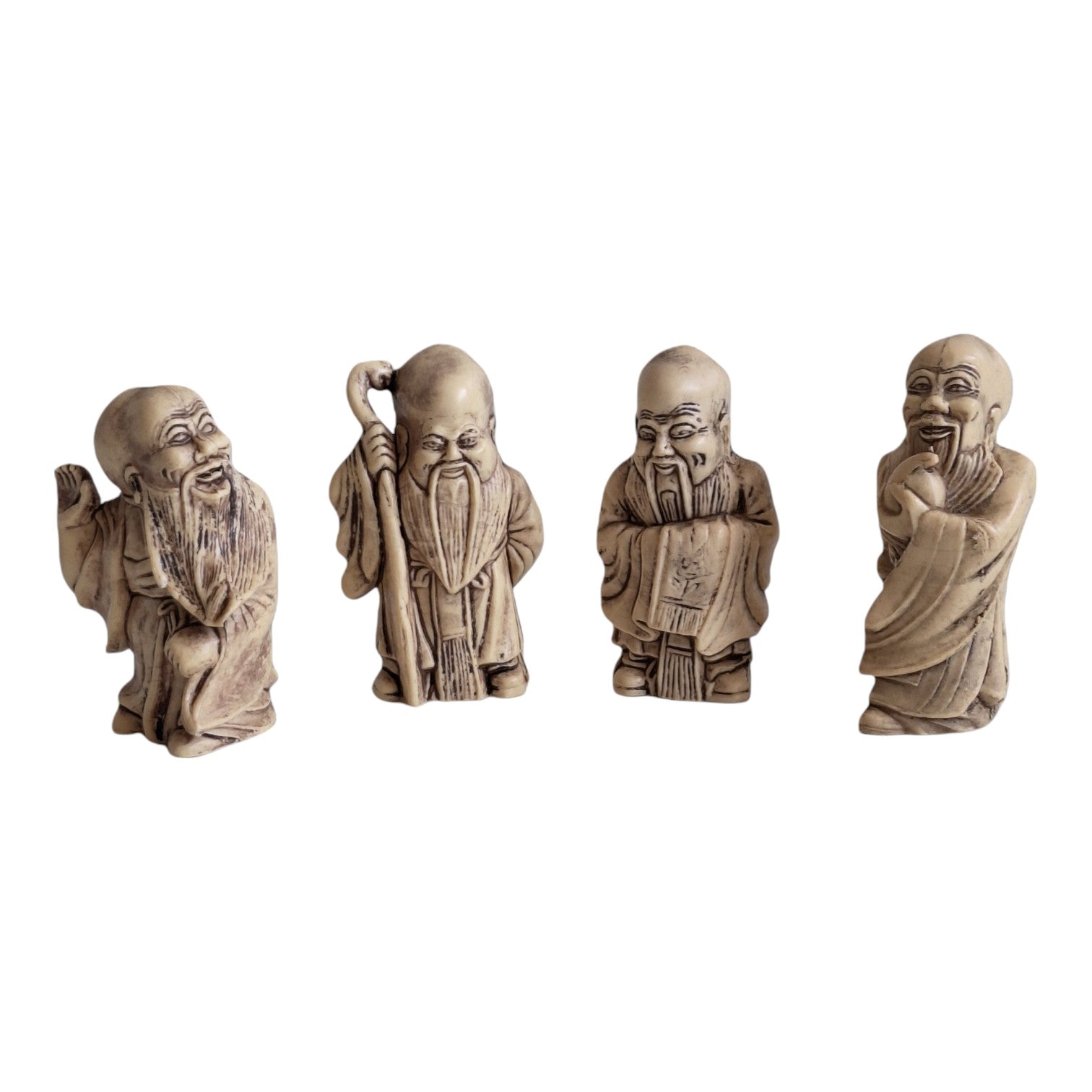 Set aus 4 Figuren im Netsuke-Stil – französische Kunststoffreproduktion, Biskuit