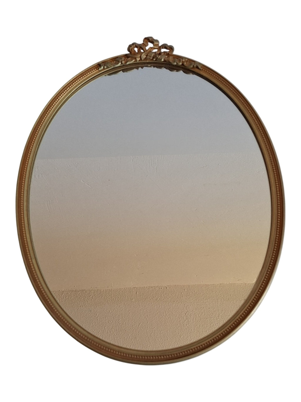 Ovale wandspiegel - neoclassicistisch goudkleurig met strikornament - 33 x 25,5 cm