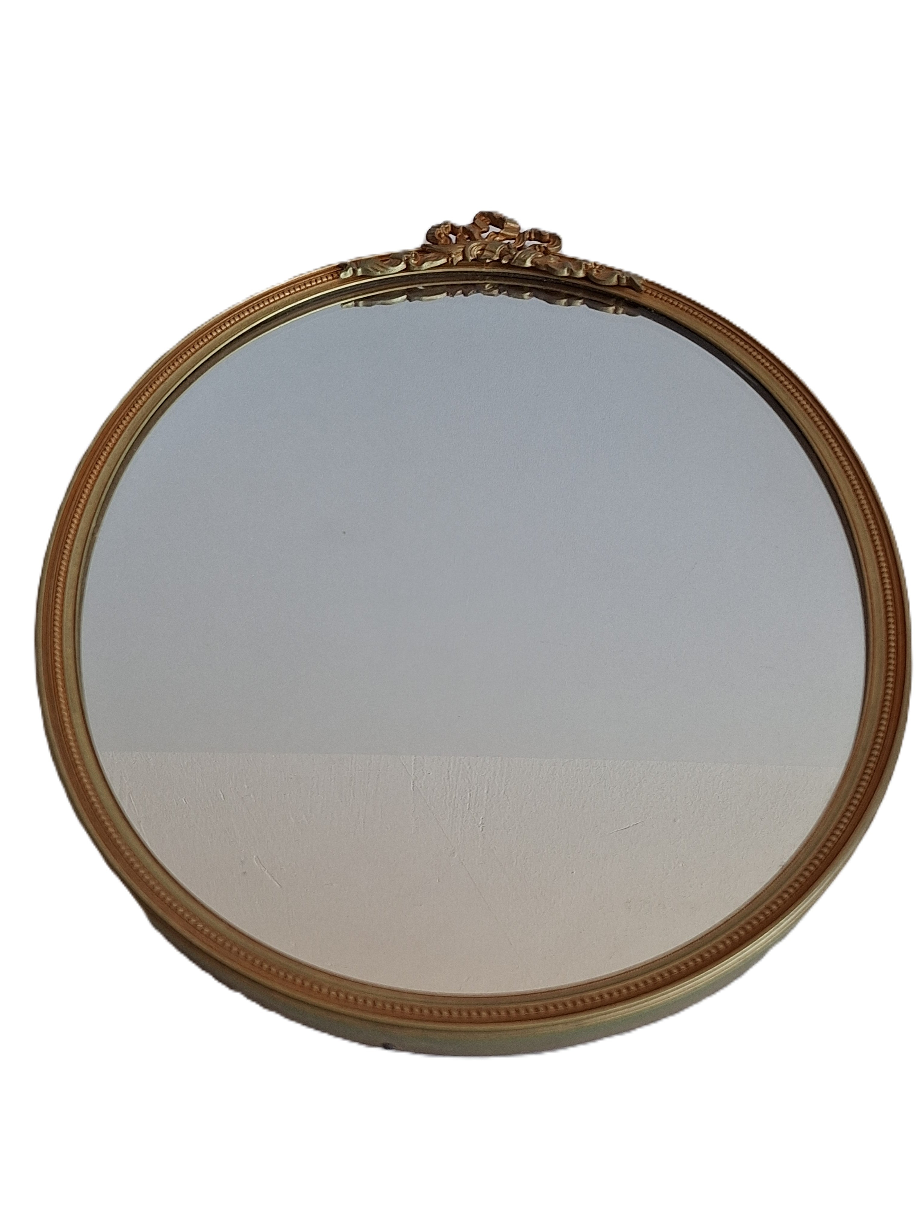 Ovale wandspiegel - neoclassicistisch goudkleurig met strikornament - 33 x 25,5 cm