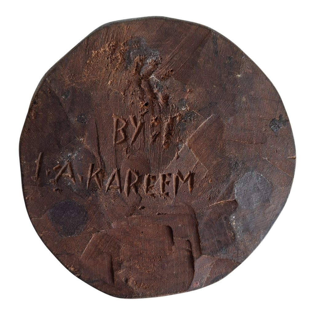 Handgesneden Afrikaanse houten kom met drie gezichten - gesigneerd I.A. Kareem