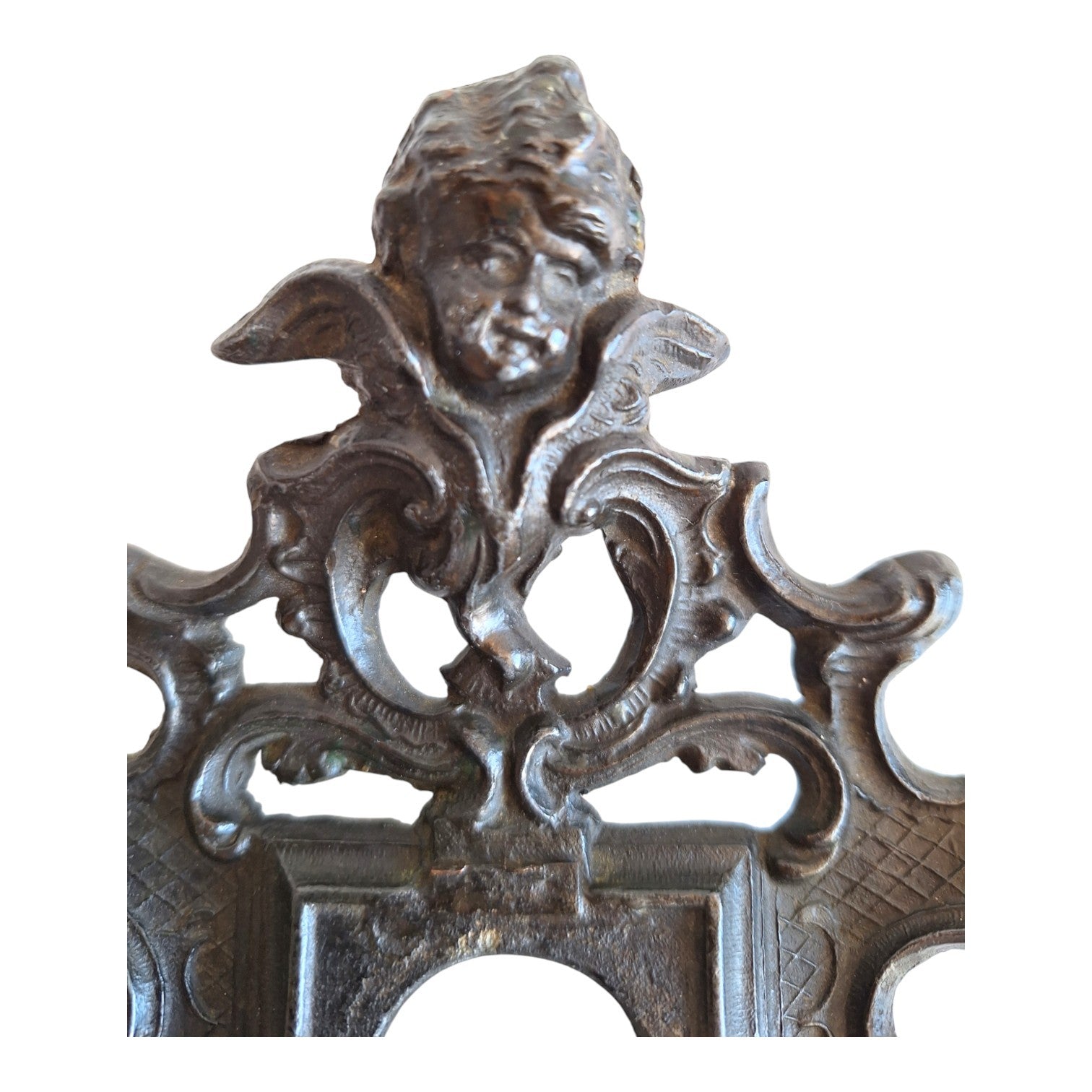 2nd Hand Bargain antique ornate metal clock frame with cherub detail and dark aged finish.