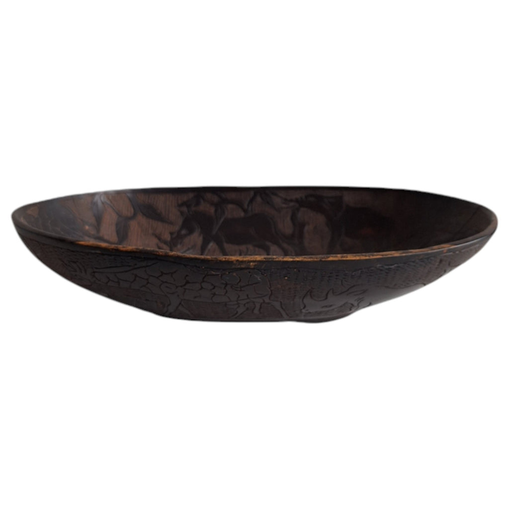 Hand-carved wooden bowl with animal motifs – African craftsmanship
